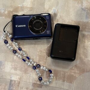 Canon Navy Blue Digital Camera with Black Charger